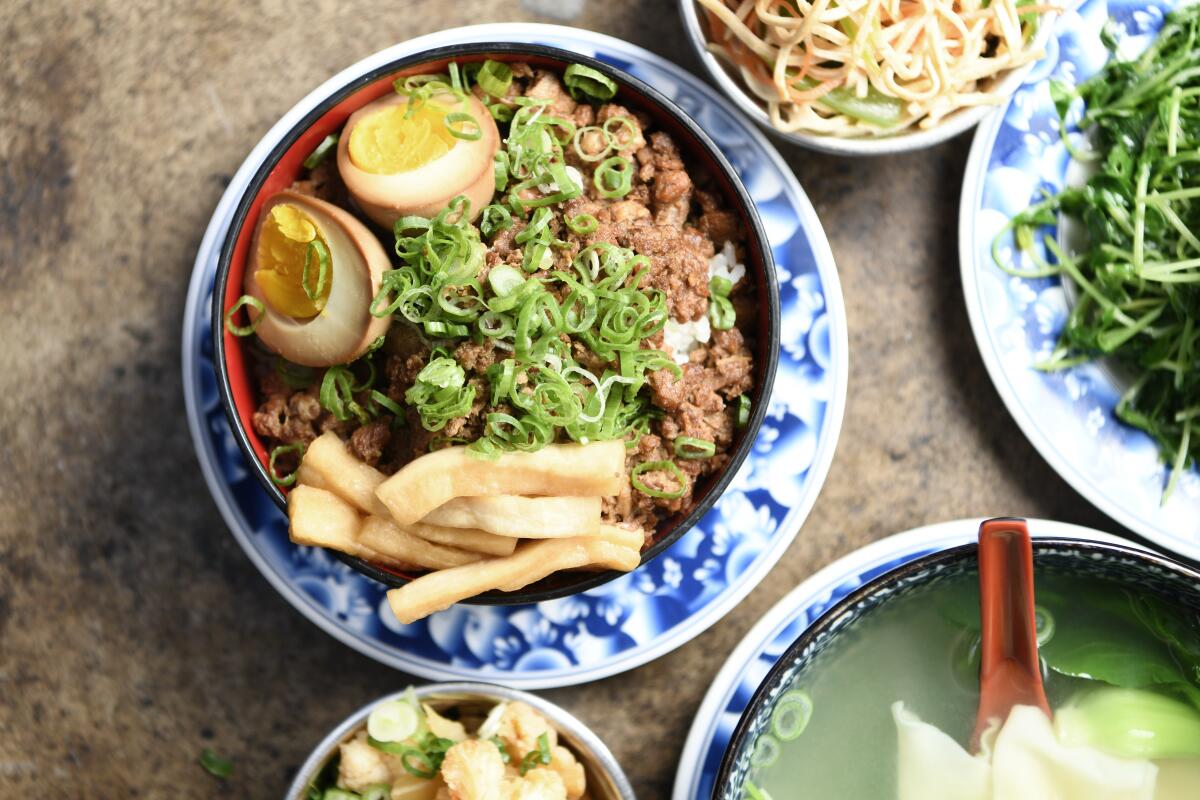 Lu rou fan, a dish of gently spiced pork over rice, is a favorite at Joy.