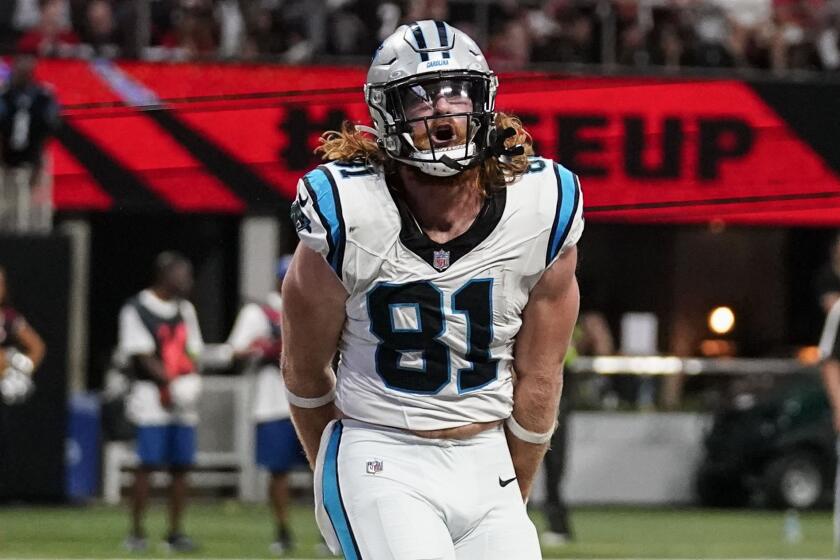 Carolina Panthers tight end Hayden Hurst (81) celebrates his touchdown against the Atlanta Falcons during the first half of an NFL football game, Sunday, Sept. 10, 2023, in Atlanta. (AP Photo/Brynn Anderson)