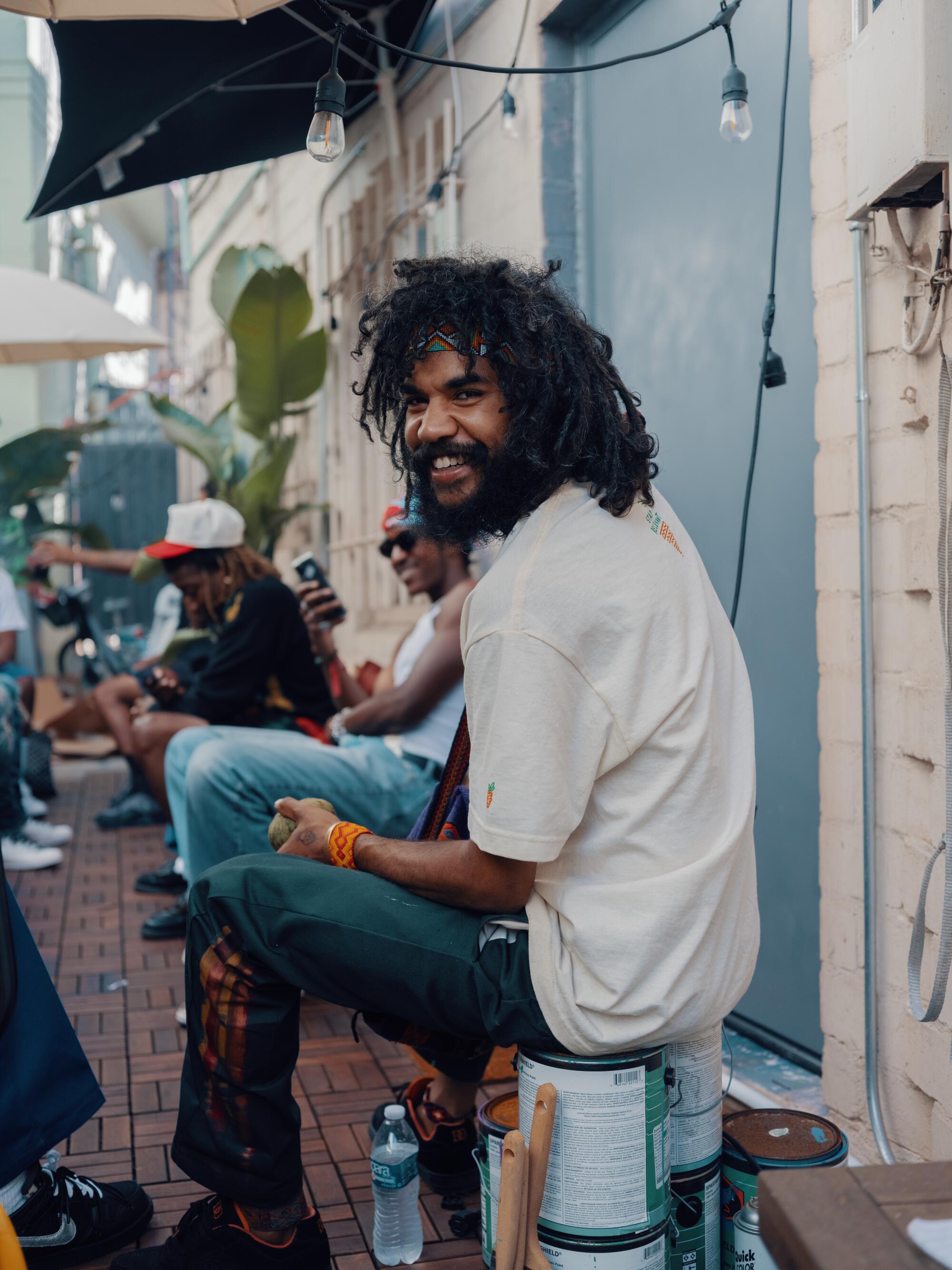 Malcolm Emilio is an artist from Leimert Park and painted murals at Neighbors Skate Shop.