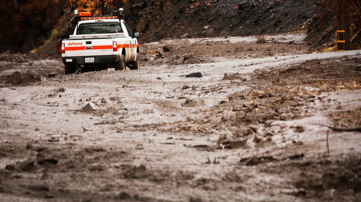 Mud and debris covers Highway 33 north of Ojai on Jan. 9 after rainstorms that also shut the 101 Freeway.