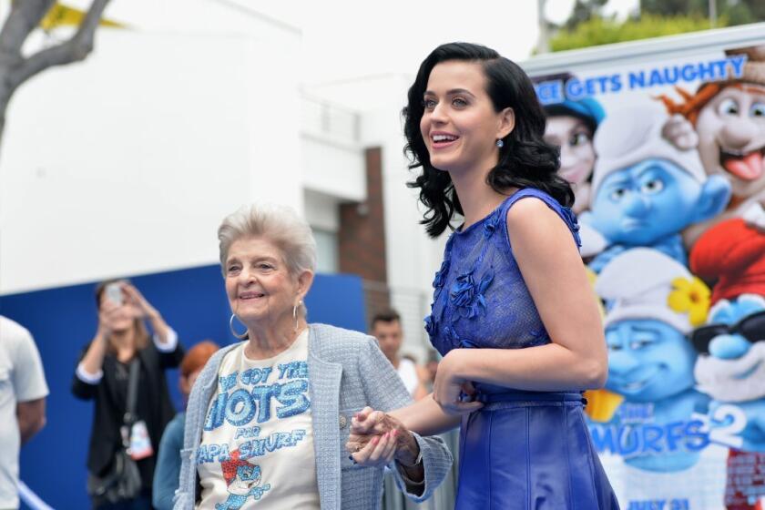 Katy Perry, right, arrives at "The Smurfs 2" premiere with her grandmother, Ann Hudson.