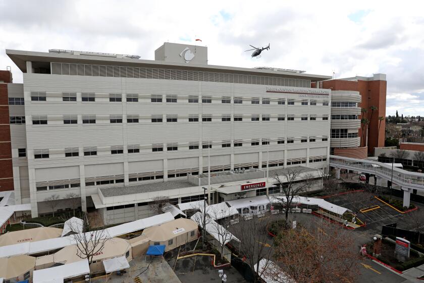 FRESNO, CA - JANUARY 29: Community Regional Medical Center is home to the Table Mountain Rancheria Trauma Center - the only Level 1 trauma center between Los Angeles and Sacramento in downtown on Friday, Jan. 29, 2021 in Fresno, CA. The Ramirez' live in a multi-generational Latino household. Dr. Rene Ramirez, 40, an emergency medicine physician at Community Regional Medical Center in Fresno, and wife Dr. Veronica Ramirez, 41, private practice, live with their four children: Andrew, 11, Samantha, 8, Danni, 5, and Ryan, 10-months, along with Veronica's mother Olga Araujo, 63, and Aunt Lupe Mendoza, 55. (Gary Coronado / Los Angeles Times)