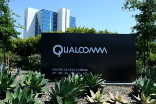 FILE PHOTO: A Qualcomm sign is pictured at one of its many campus buildings in San Diego, California, U.S. April 18, 2017. REUTERS/Mike Blake/File Photo ** Usable by SD ONLY **