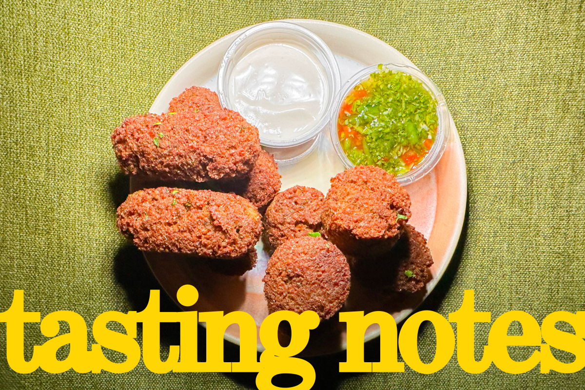 An at-home plating of two shapes of falafel, served with tahini sauce and shatta (hot sauce), from Salam Falafel in Koreatown