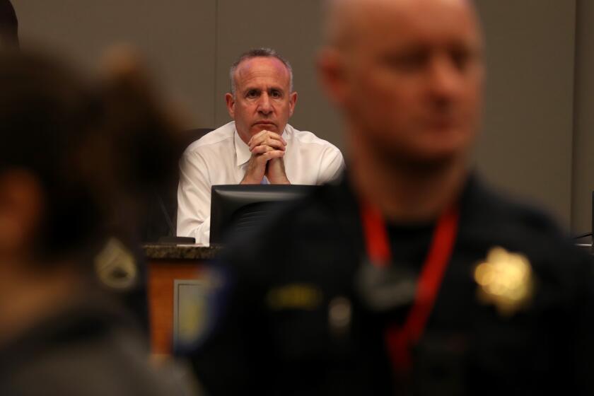 SACRAMENTO, CALIFORNIA - MARCH 05: Sacramento mayor Darrell Steinberg looks on as activists disrupt the Sacramento city council meeting on March 05, 2019 in Sacramento, California. A day after over 80 protesters were arrested during a march through Sacramento city streets, the Sacramento city council held a public meeting and sought answers as to why the protest ended with dozens of arrests. California Attorney General Xavier Becerra announced earlier in the day that his office concluded that the two Sacramento police officers that shot and killed Stephon Clark, an unarmed black man, will not face criminal charges for their role in the shooting. (Photo by Justin Sullivan/Getty Images)