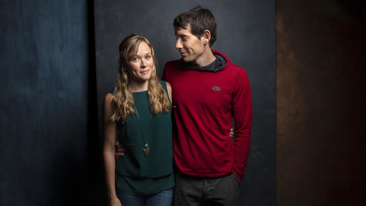 In addition to documenting the historic rope-free climb of El Capitan by Alex Honnold, right, "Free Solo" observes his relationship with Sanni McCandless, left.