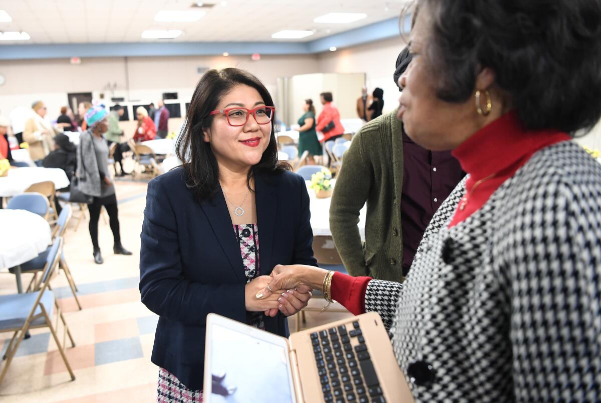 Attorney Grace Yoo after a candidate forum in January