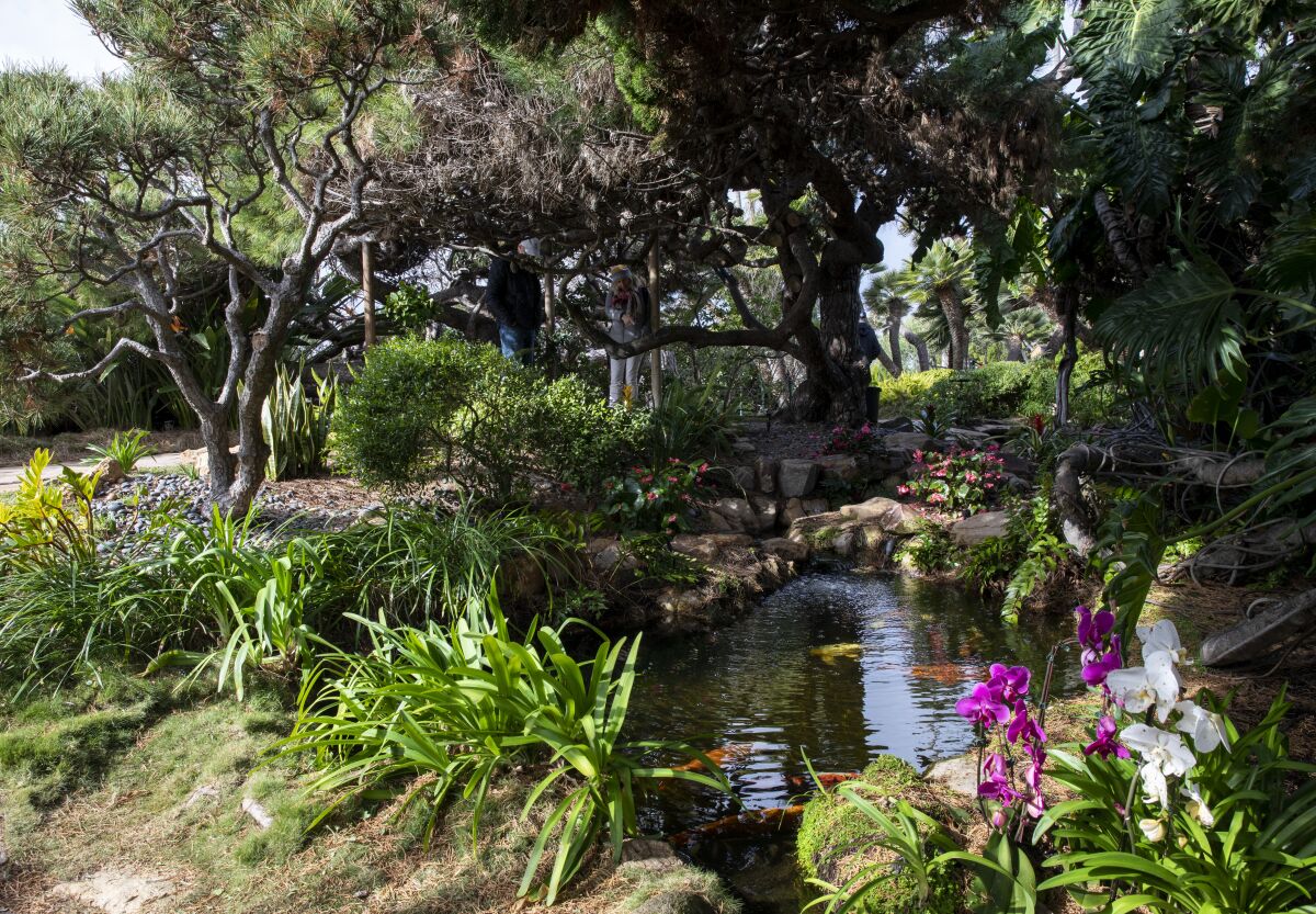 People enjoy the newly reopened Meditation Gardens at Self-Realization Fellowship on Wednesday in Encinitas.