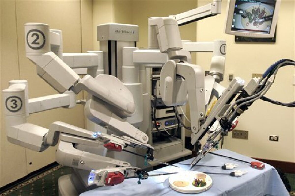 This Friday, June 13, 2008, file photo shows the da Vinci Surgical Robot at a hospital in Pittsburgh.