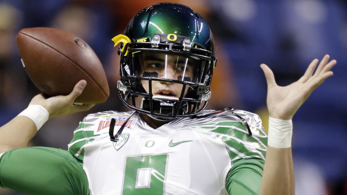 Oregon's Marcus Mariota is one of several high-profile quarterbacks who will be playing in the Pac-12 again this season.