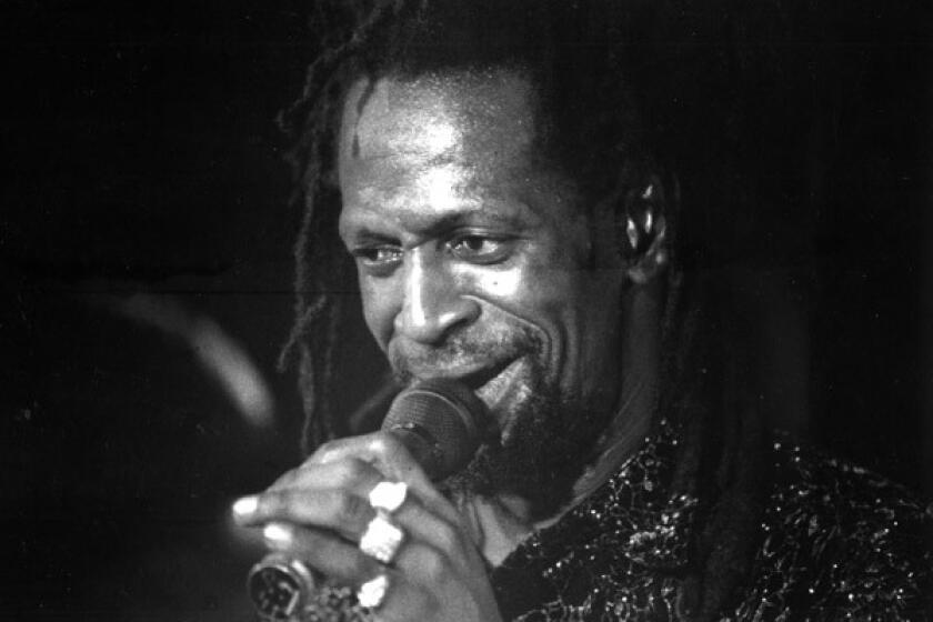 Gregory Isaacs in 1992 during a performance at the Veterans Auditorium in Culver City.