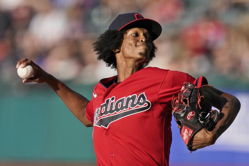 Cleveland Indians starting pitcher Triston McKenzie delivers in the first inning of a baseball game against the Kansas City Royals, Friday, July 9, 2021, in Cleveland. (AP Photo/Tony Dejak)