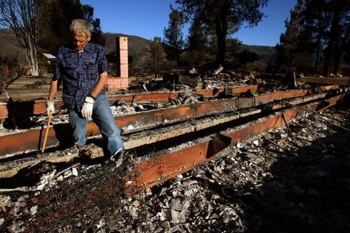 Joe Biviano, 63, returned Monday to find his home burned to the ground by the Powerhouse fire in Lake Hughes.