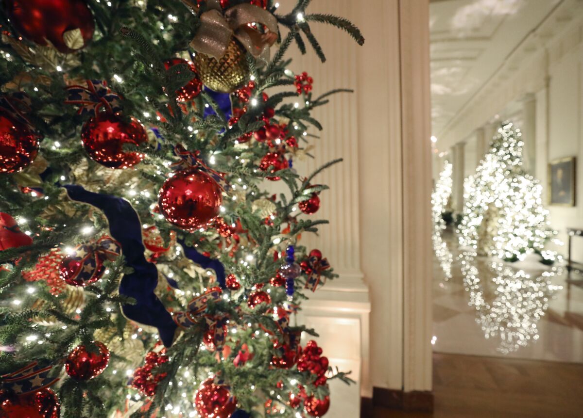 Christmas decorations are displayed Monday in the East Room of the White House. 