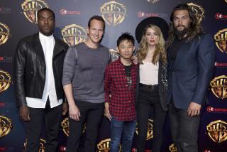 Yahya Abdul-Mateen II, from left, Patrick Wilson, director James Wan, Amber Heard and Jason Momoa, members of the cast and crew of the upcoming film "Aquaman," arrive at the Warner Bros. presentation at CinemaCon 2018, the official convention of the National Association of Theatre Owners, at Caesars Palace on Tuesday, April 24, 2018, in Las Vegas. (Photo by Chris Pizzello/Invision/AP)