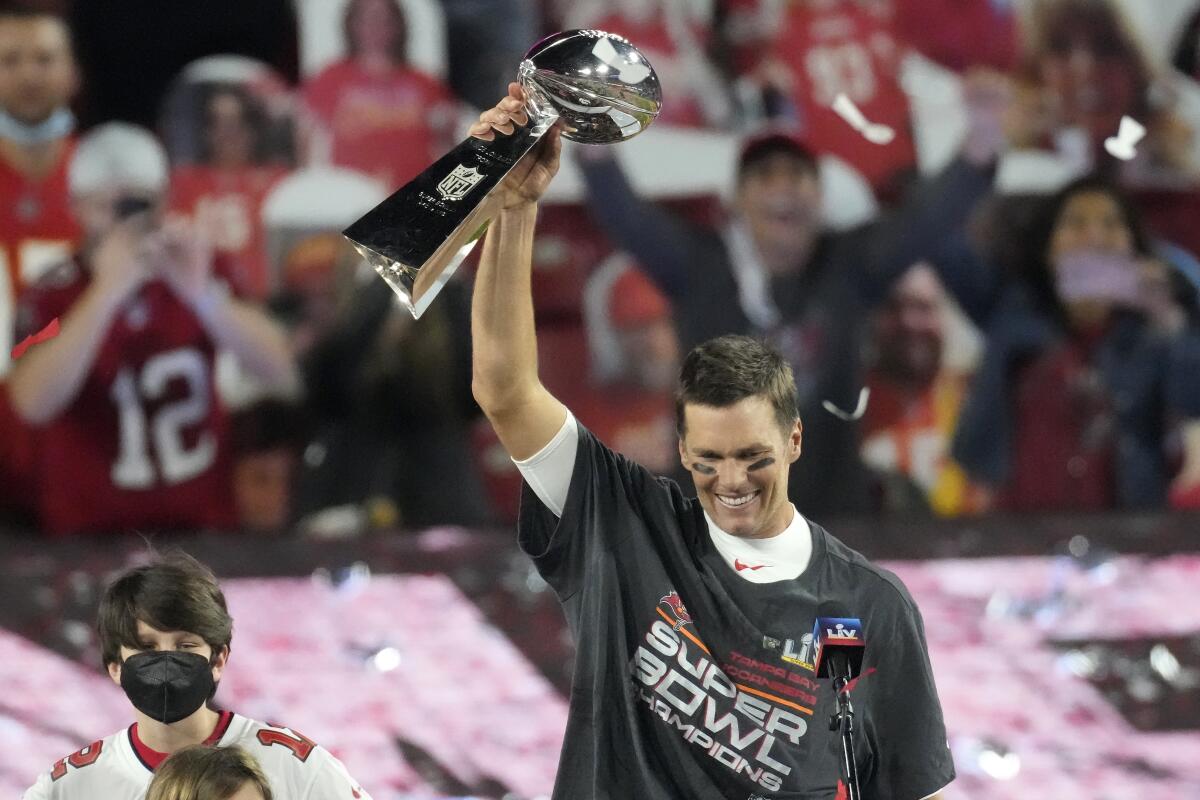 Tampa Bay Buccaneers quarterback Tom Brady celebrates after defeating the Kansas City Chiefs in the NFL Super Bowl 55.