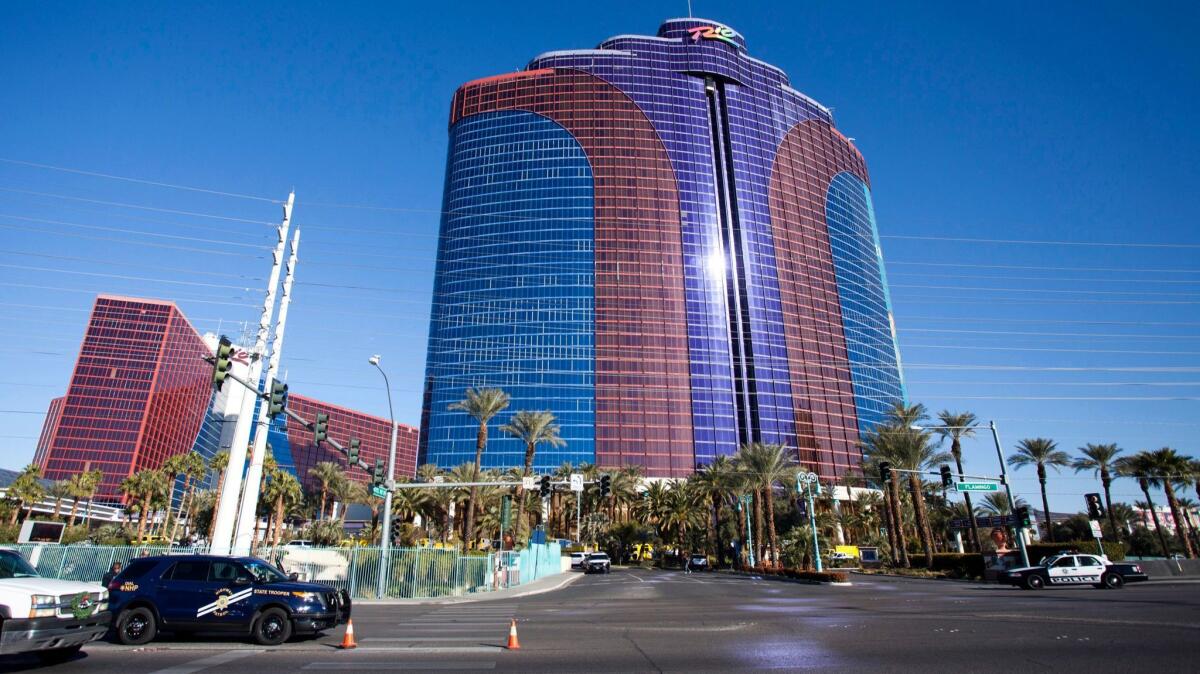 Authorities block the entrance to the Rio Hotel & Casino after a power failure led to guest evacuation Thursday. More than 400 rooms in the Masquerade Tower are out of commission for several days.