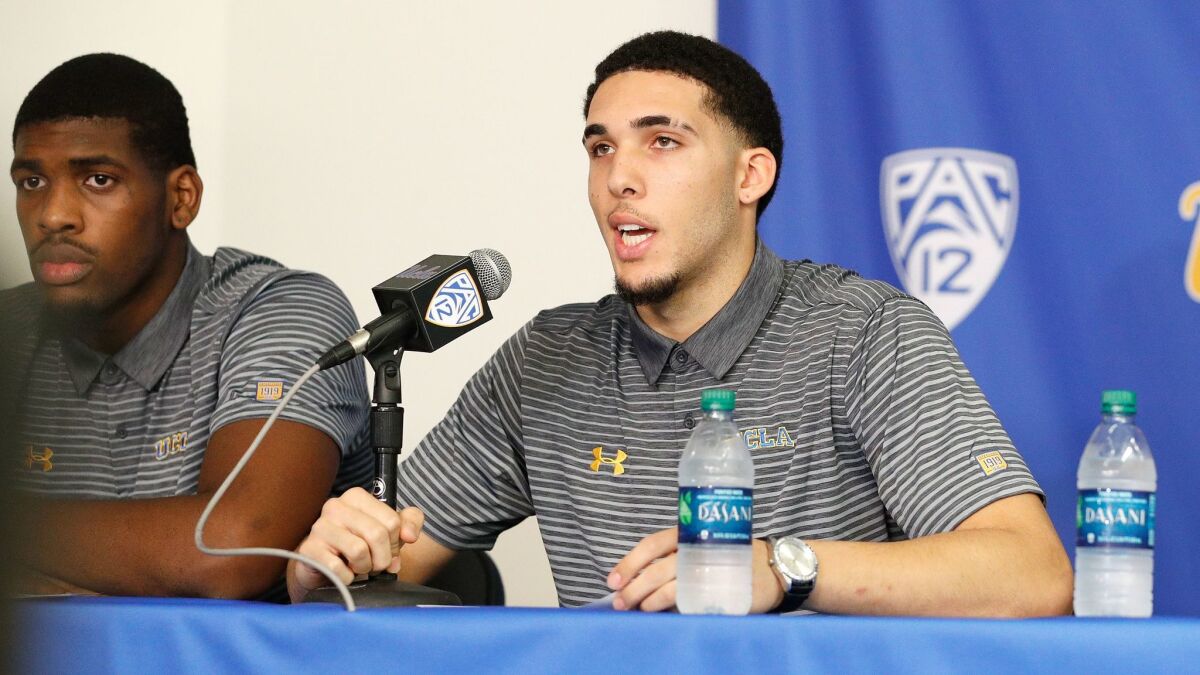 Cody Riley, left, and LiAngelo Ball at a news conference at UCLA on Wednesday.