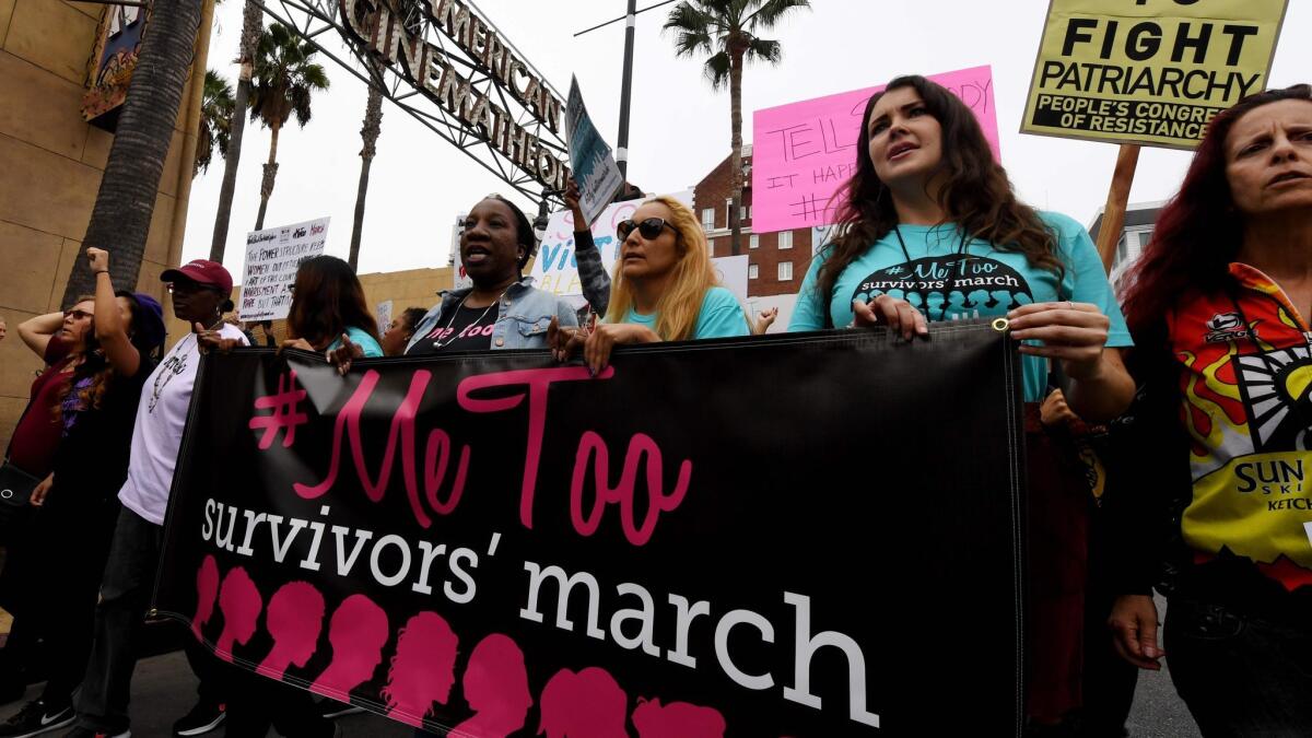 Victims of sexual harassment and assault protest with their supporters during a #MeToo march in Hollywood on Nov. 12.