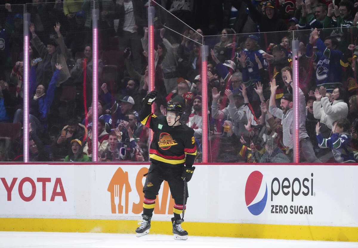 Andrei Kuzmenko of the Vancouver Canucks celebrates his goal in