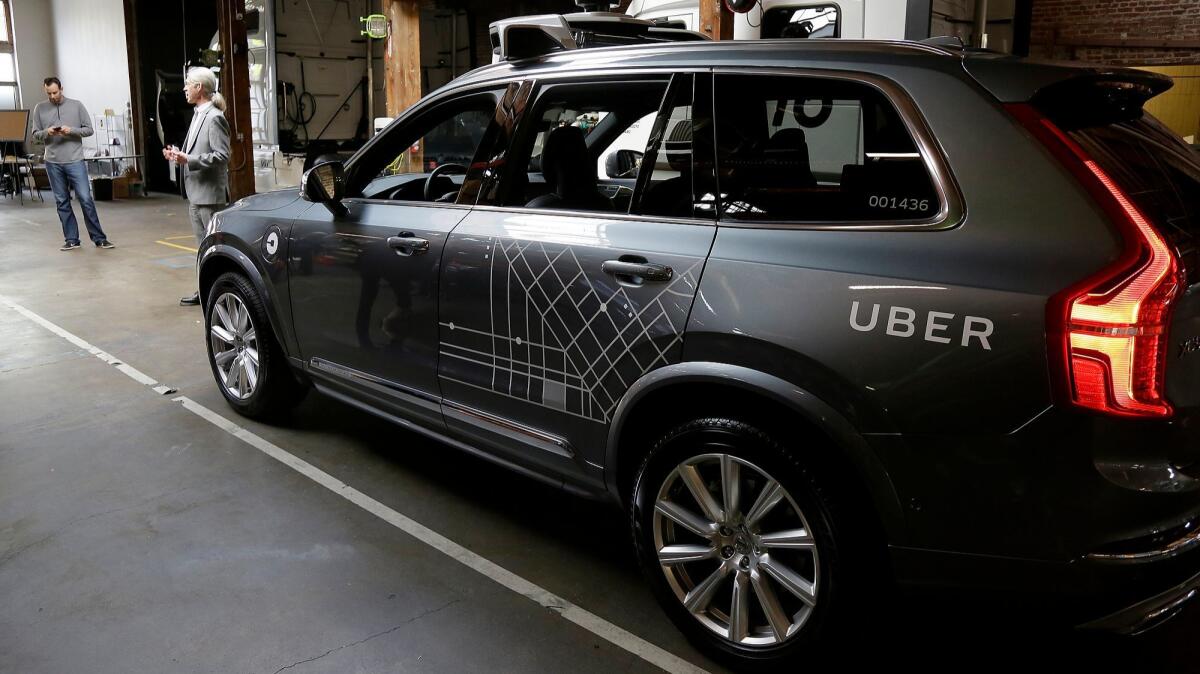 An Uber driverless car is displayed in a garage in San Francisco. (Eric Risberg / AP)