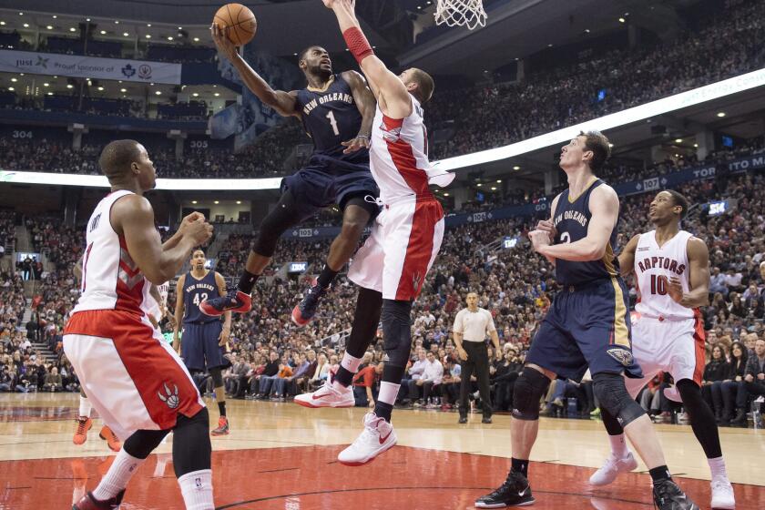 Pelicans guard Tyreke Evans attempts a shot in the middle of the lane against the Raptors Sunday night. Evans later made the game-winning basket with less than two seconds remaining.