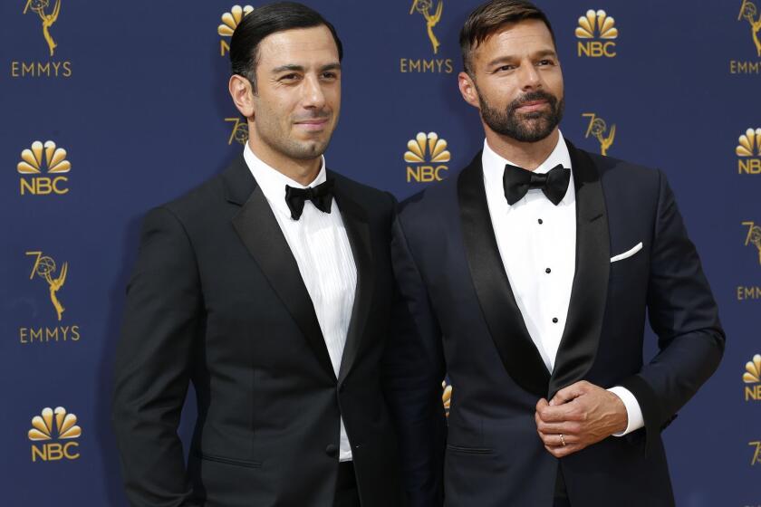 LOS ANGELES, CA., September 17, 2018: Jwan Yosef and Ricky Martin arriving at the 70th Primetime Emmy Awards at the Microsoft Theater?in Los Angeles, CA. (Marcus Yam / Los Angeles Times)