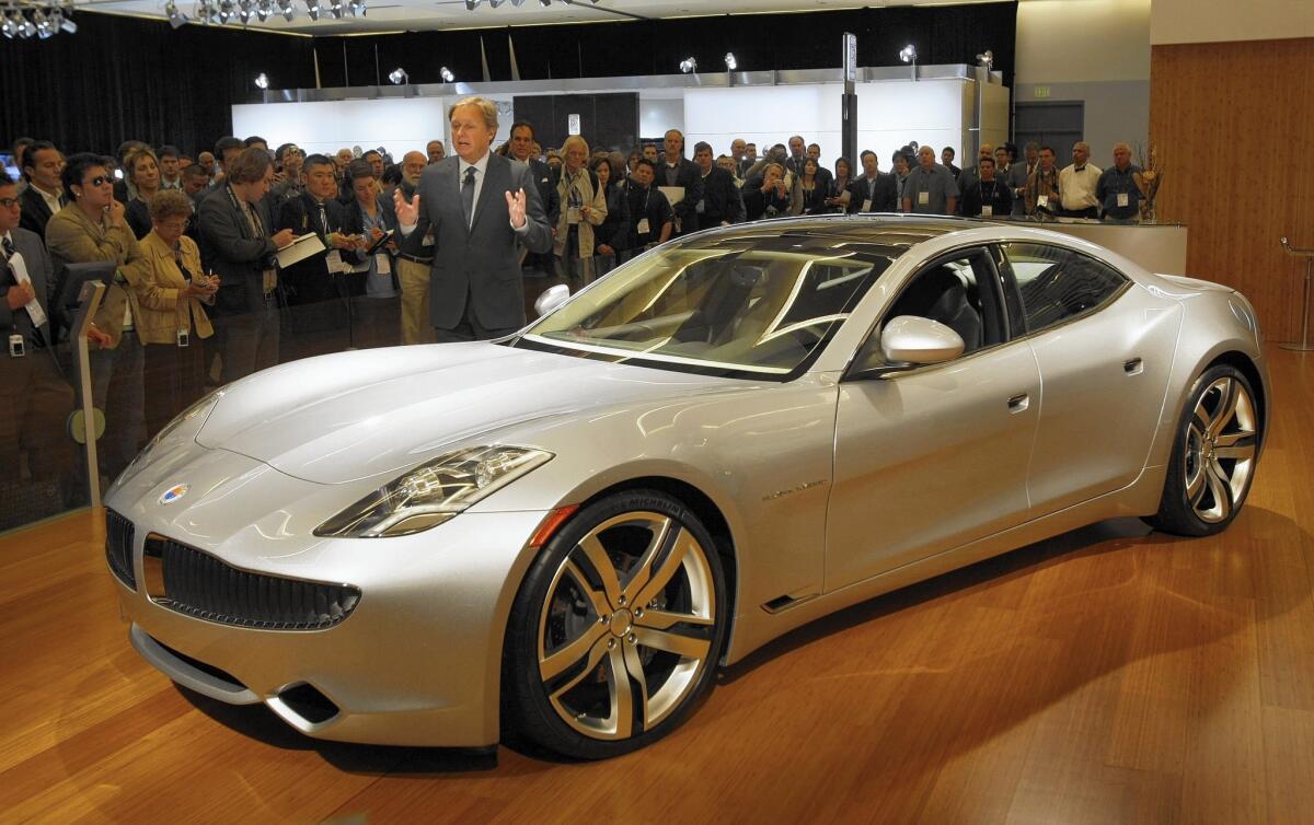 In 2009, Henrik Fisker shows his Karma plug-in car in L.A. Battery glitches resulted in a recall, and the firm was bought out of bankruptcy in 2014. Cars from the Moreno Valley plant could go on sale in mid-2016.