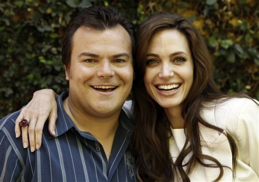 In this April 14, 2011 photo, actors Angelina Jolie, right, and Jack Black, from the upcoming film "Kung Fu Panda 2", pose for a portrait in Glendale, Calif. The film is due in U.S. theaters on May 26. (AP Photo/Matt Sayles)