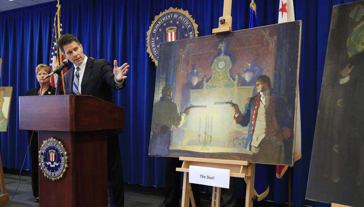 Beverly Hills Police Det. Michele Fieler, left, and FBI assistant Director in Charge David Bowdich at a news conference to announce the FBI is offering a reward of as much as $20,000 to anyone who can provide information leading to the recovery of the two N.C. Wyeth paintings.