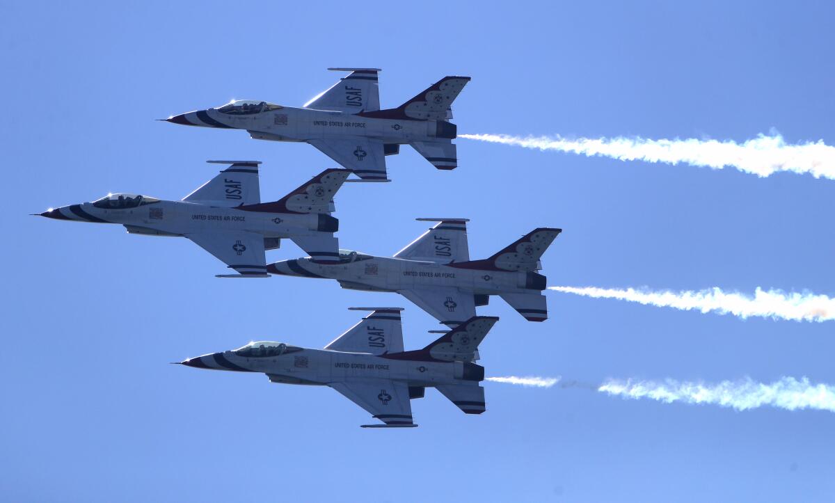 The United States Air Force Thunderbirds fly in close formation at the Great Pacific Airshow in 2019.