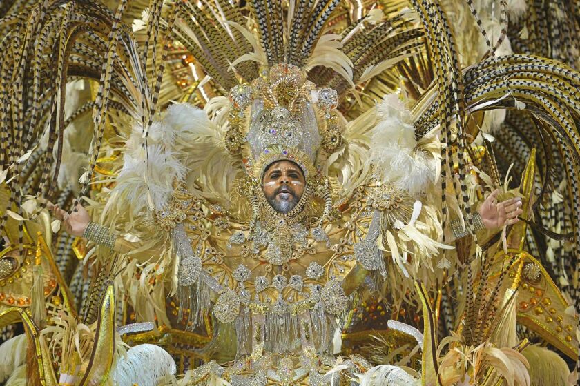 A member of the "Salgueiro" samba school performs during the first night of Rio's Carnival at the Sambadrome in Rio de Janeiro, Brazil.