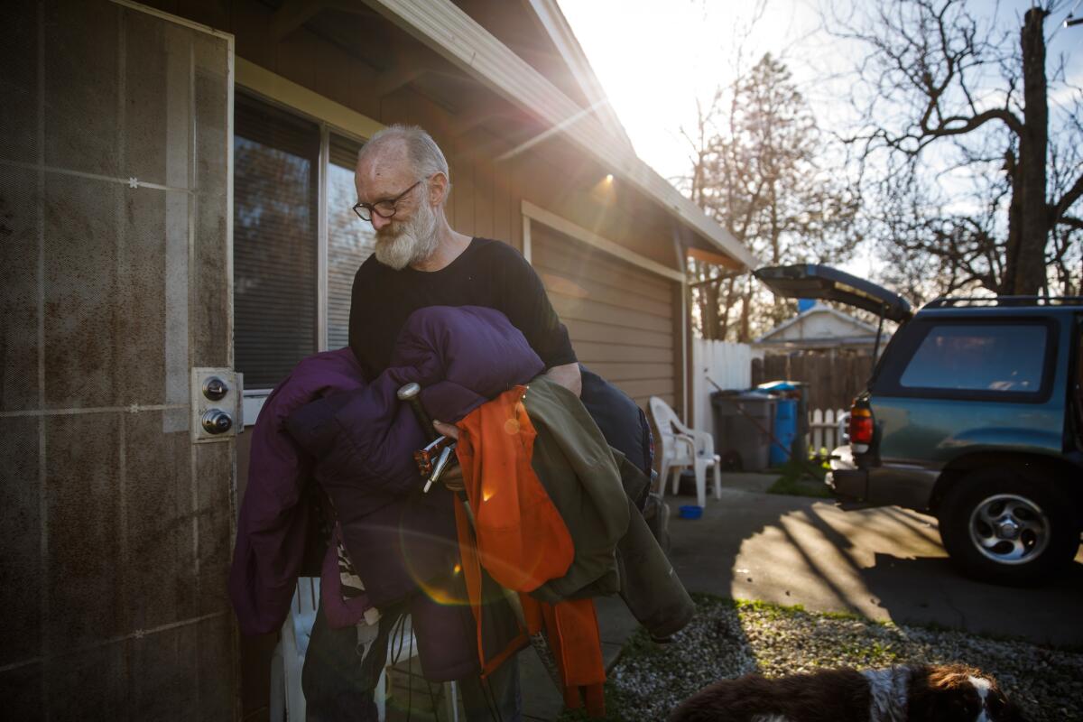 David McGlamery returns to his Oroville home with his belongings after the evacuation order was lifted. The family had to retreat to Chico, where they initially stayed at a Walmart parking lot with other evacuees.