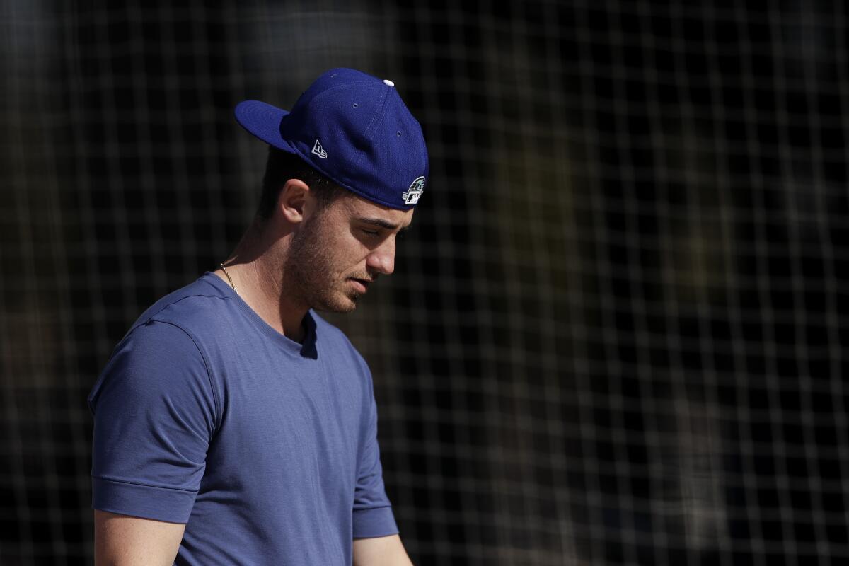 Dodgers outfielder Cody Bellinger leaves the batting cages in Glendale, Ariz.