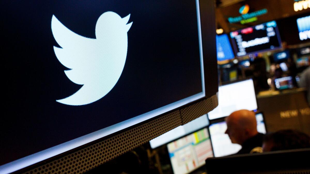 Twitter's logo appears on a screen at the New York Stock Exchange on July 27.