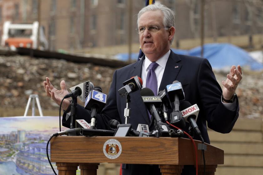 Missouri Gov. Jay Nixon appears at a news conference Tuesday at the site of a proposed NFL stadium for the St. Louis Rams.