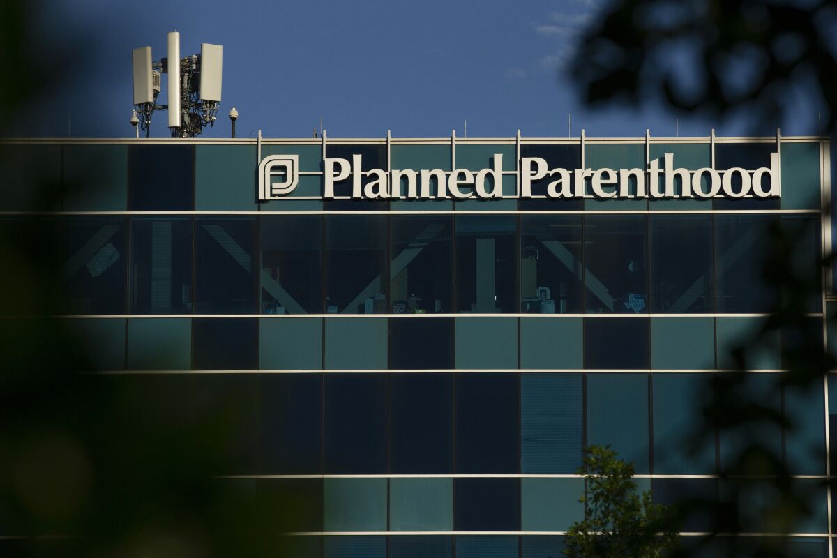 FILE - This April 19, 2019, file photo shows a Planned Parenthood building in Houston. Texas wants Planned Parenthood to return more than $10 million in payments for low-income patients under a lawsuit filed Thursday, Jan. 13, 2022, years after Republican leaders moved to cut off Medicaid dollars to the abortion provider. (Godofredo A Vasquez/Houston Chronicle via AP, File)