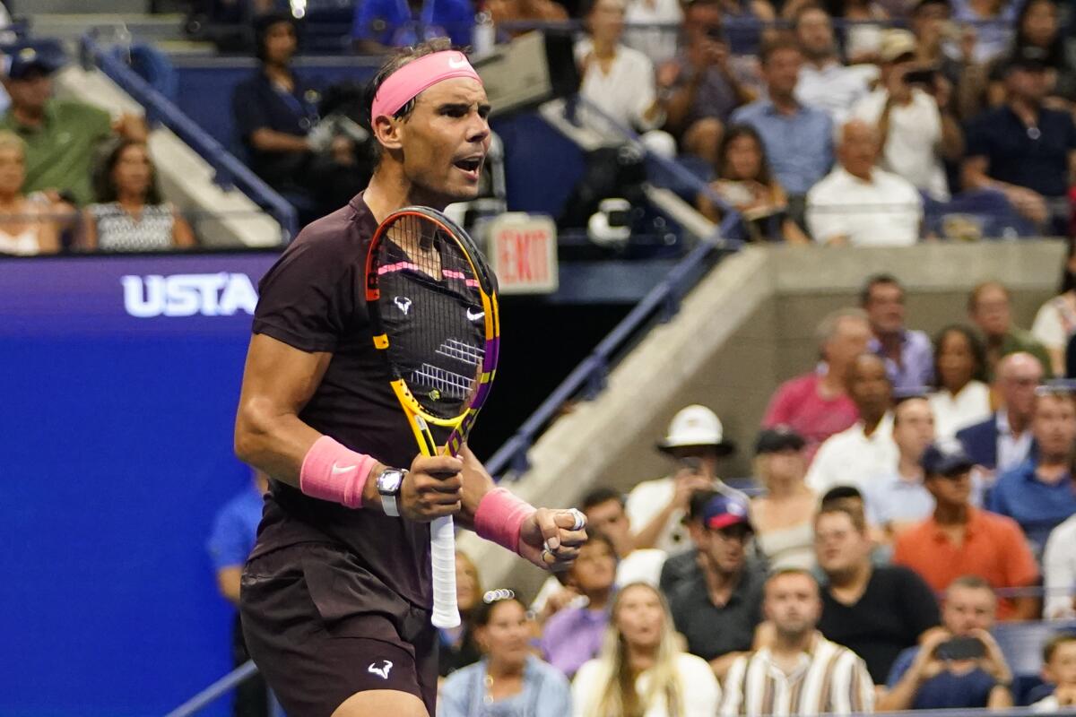 Rafael Nadal reacts after winning a set against Rinky Hijikata.