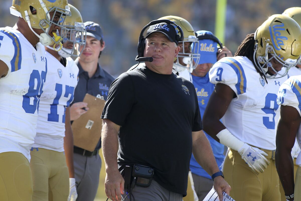 UCLA coach Chip Kelly looks on during a game.