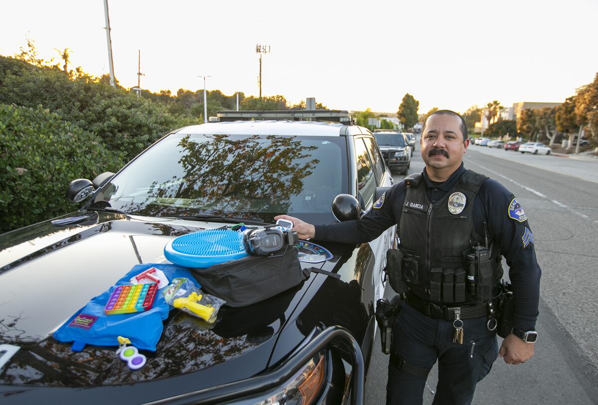Sgt. Joe Garcia displays a sensory kit designed to help officers in the field interact with children and adults with autism.