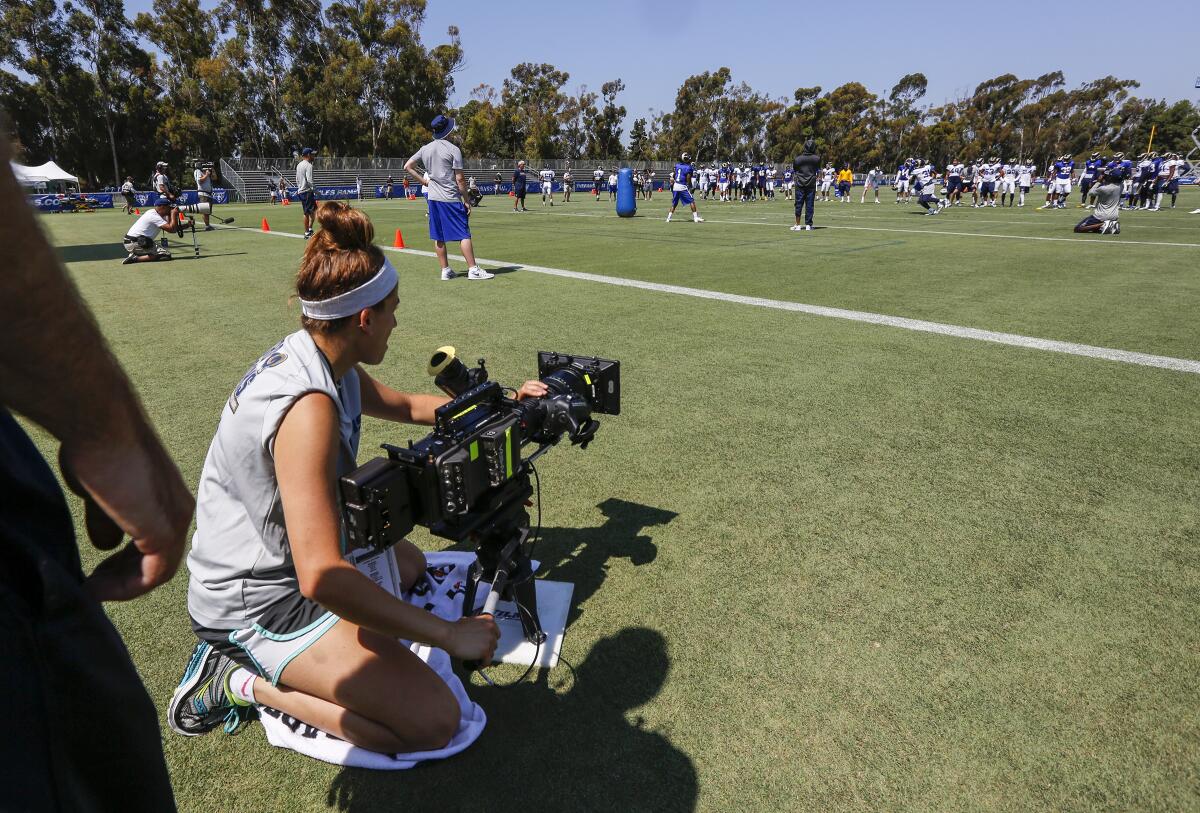 The "Hard Knocks" camera crew films a Rams practice in 2016.
