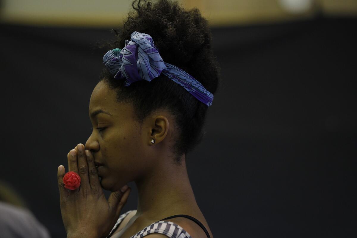 Actress Daniele Watts rehearses a scene from the play "Before the Revolution" in 2012.
