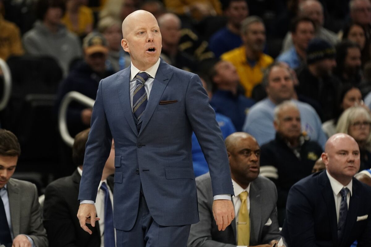 Bruins coach Mick Cronin looks on during the first half Dec. 11, 2021, in Milwaukee.