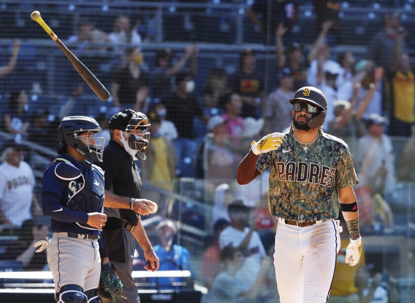 The Padres' Fernando Tatis Jr. hits a home run