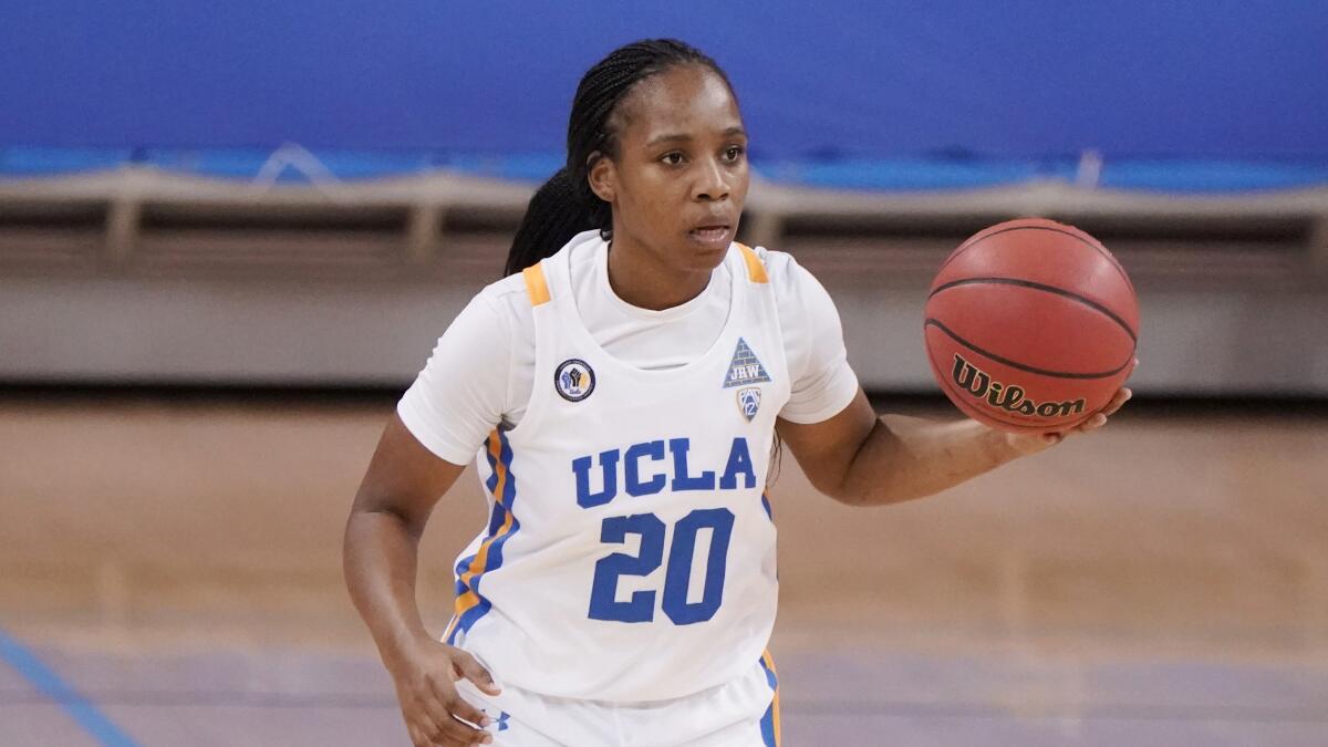 UCLA guard Charisma Osborne dribbles against Stanford during an NCAA college basketball game Monday.