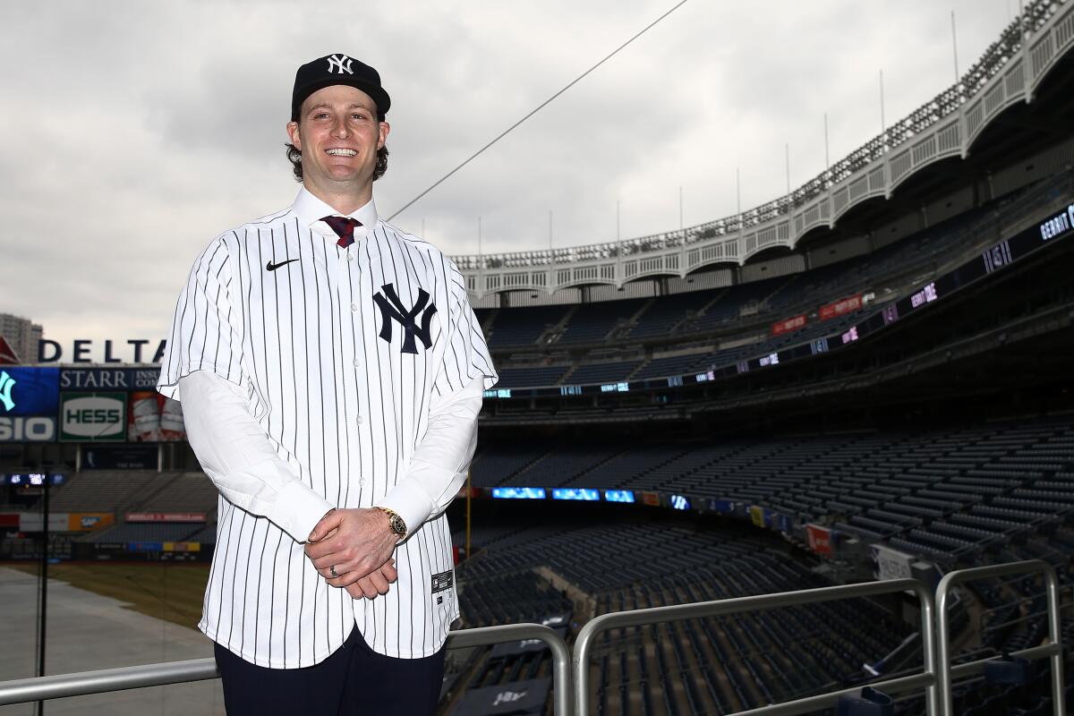 Yankees pitcher Gerrit Cole stands in Yankee Stadium.