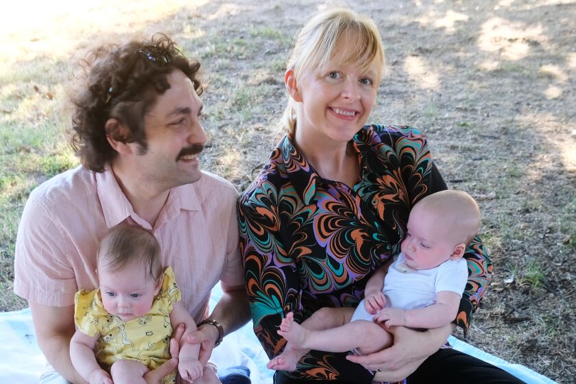 Boris Dralyuk and Jenny Croft, two translators in fierce competition for this year's National Book Critics Circle Award in translation, with their infant twis.