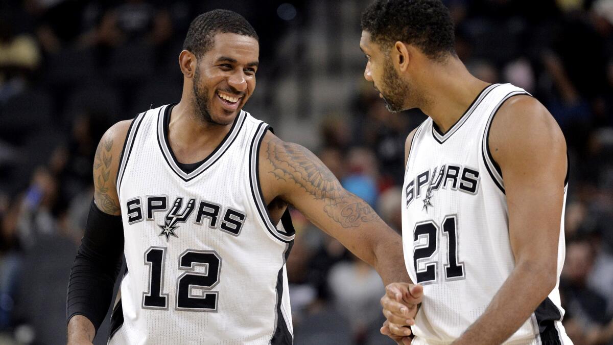 The reloaded Spurs could be an NBA Finals contender if former Trail Blazers All-Star LaMarcus Aldridge (12) and Tim Duncan mesh this season.