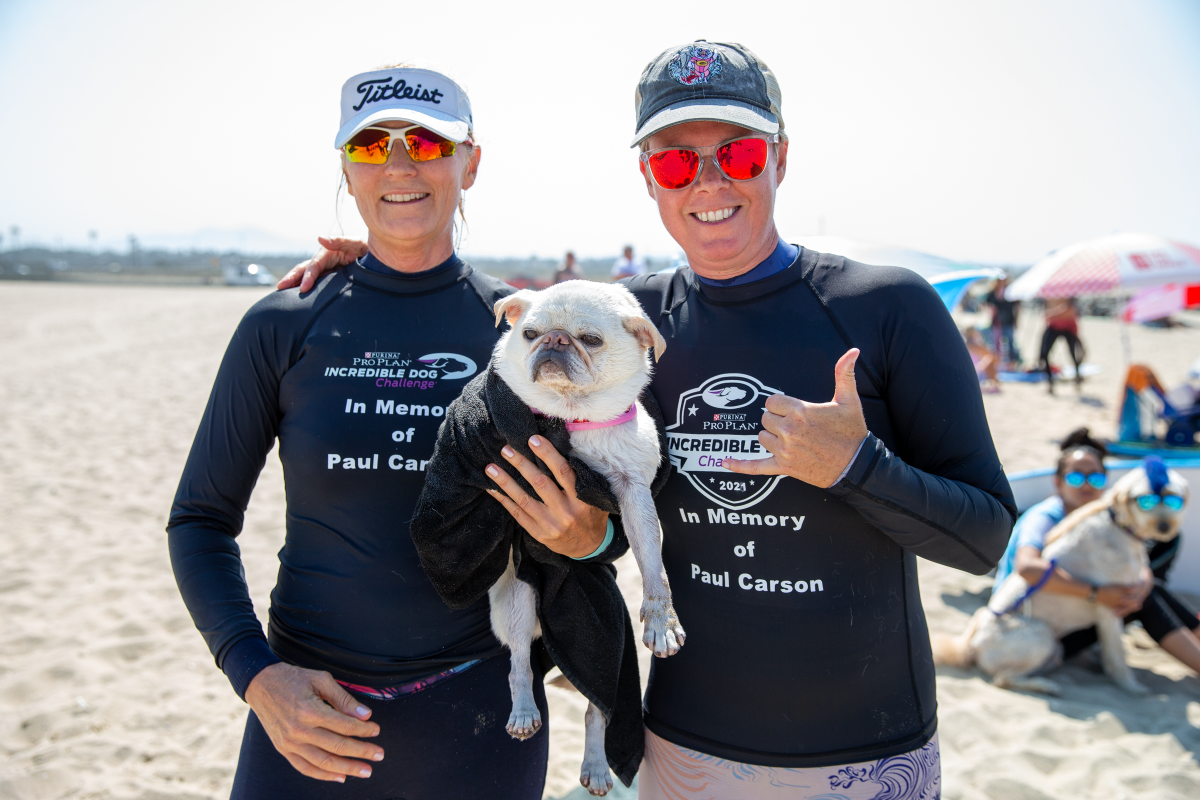 Gidget, with her trainer Alecia Nelson, left, is  8-year-old female pug from San Clemente.