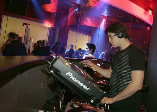 DJ Alex Dyer at a new dance club in Anaheim's Garden Walk called Heat Ultra Lounge.